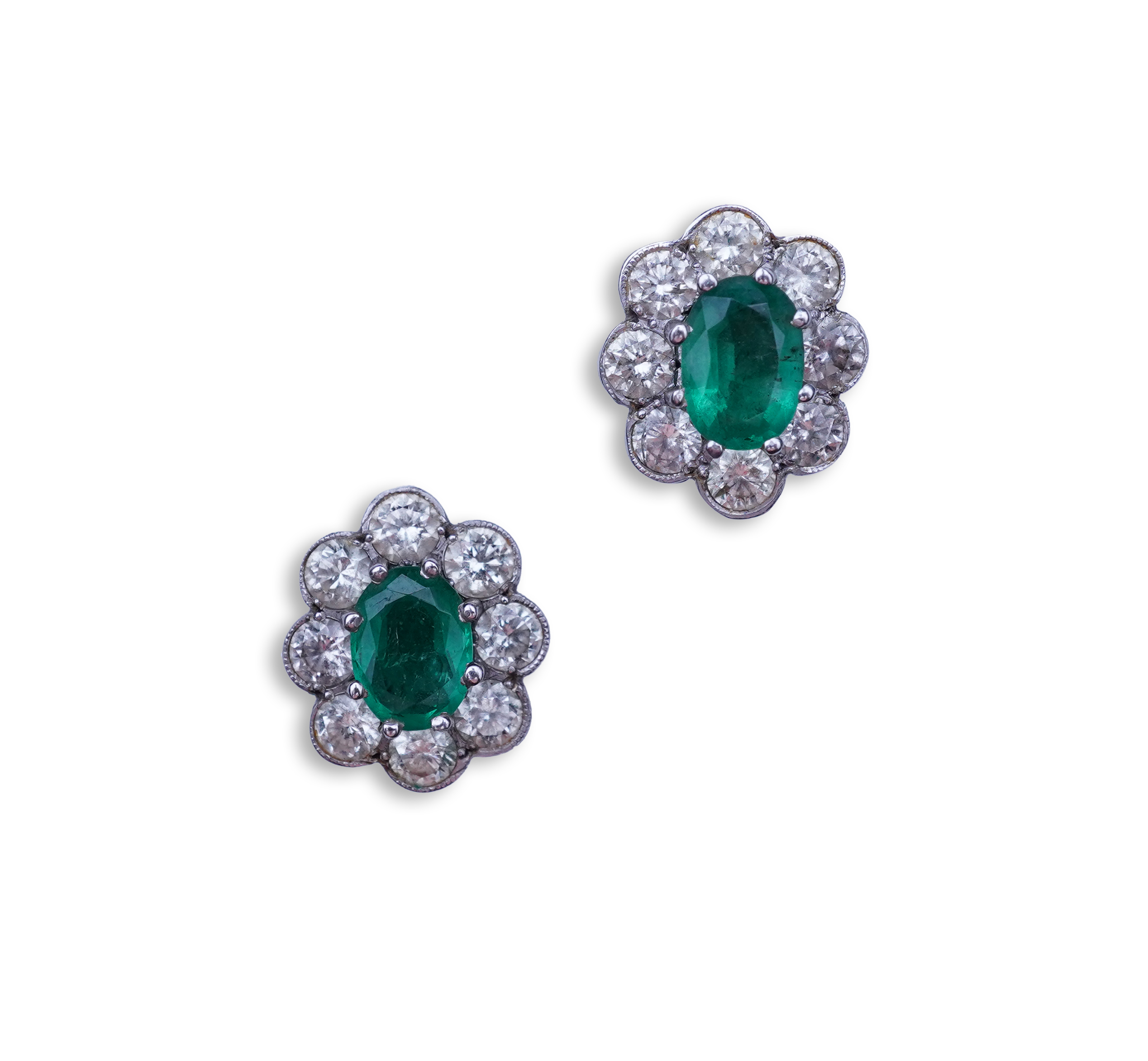 A pair of emerald and diamond earrings